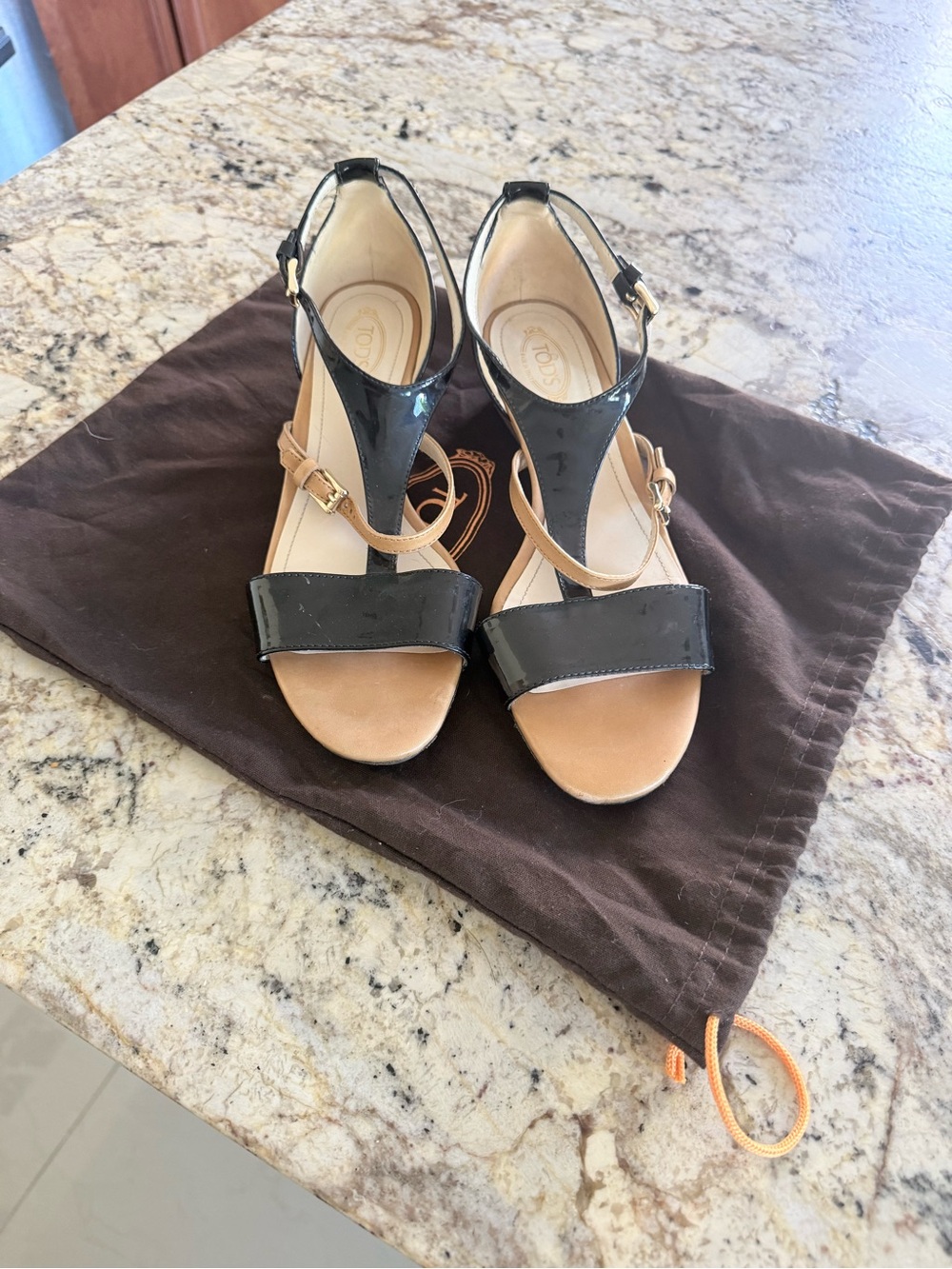 Tod's Black Patent Leather T-Strap Sandals with Tan Footbed
